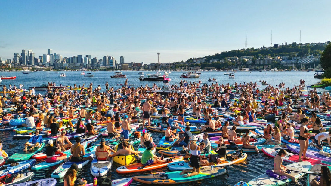 Seattle Paddle Rave crowd on Lake Union at sunset