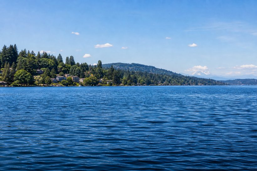 Paddle board and kayak on a calm lake near Seattle